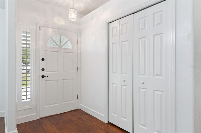 9505 NW 4th Pl, Gainesville, FL 32607 - foyer with baseboards and dark wood finished floors