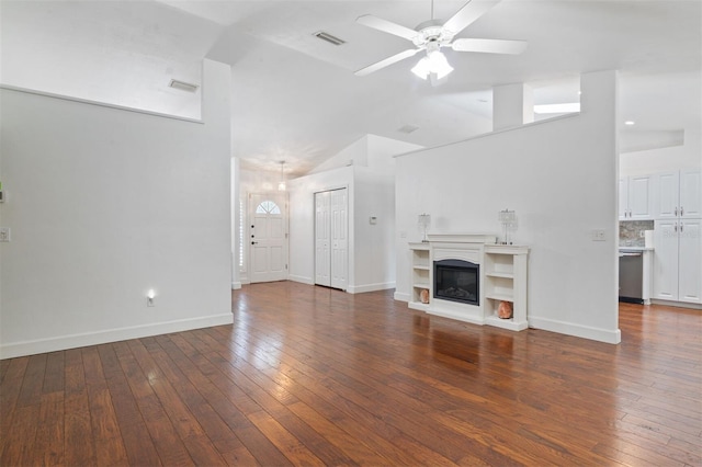 9505 NW 4th Pl, Gainesville, FL 32607 - unfurnished living room with visible vents, hardwood / wood-style floors, ceiling fan, and high vaulted ceiling