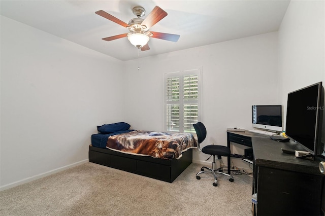 9505 NW 4th Pl, Gainesville, FL 32607 - bedroom with baseboards, ceiling fan, and carpet