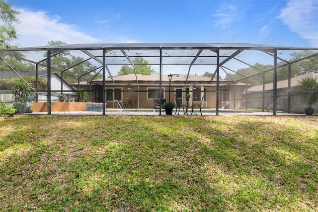 9505 NW 4th Pl, Gainesville, FL 32607 - back of house with a yard, a patio, an outdoor pool, and a lanai