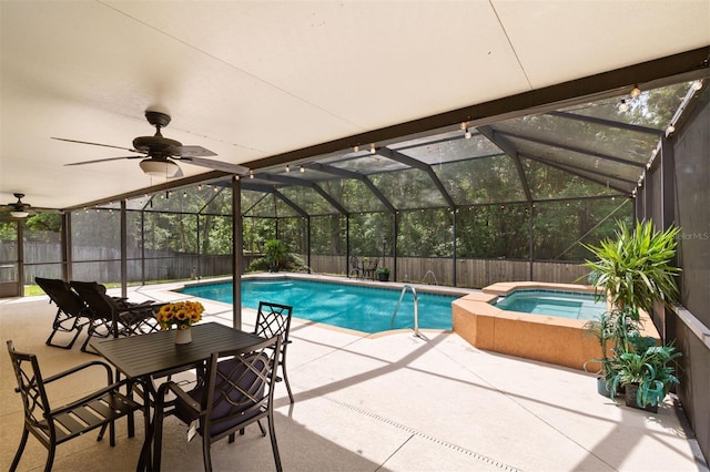 9505 NW 4th Pl, Gainesville, FL 32607 - view of pool featuring a pool with connected hot tub, a patio area, a lanai, a fenced backyard, and ceiling fan