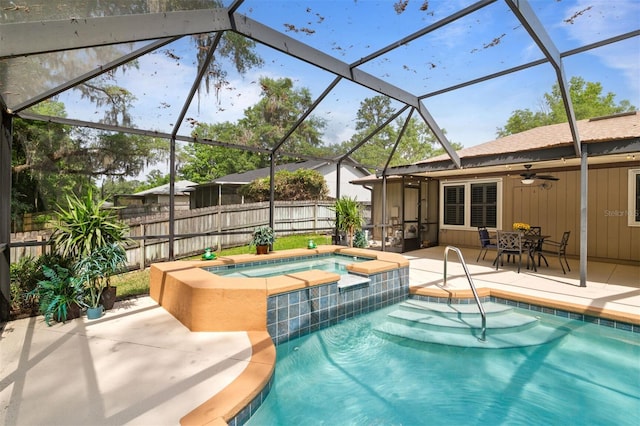 9505 NW 4th Pl, Gainesville, FL 32607 - view of pool with a ceiling fan, a patio area, glass enclosure, and fence