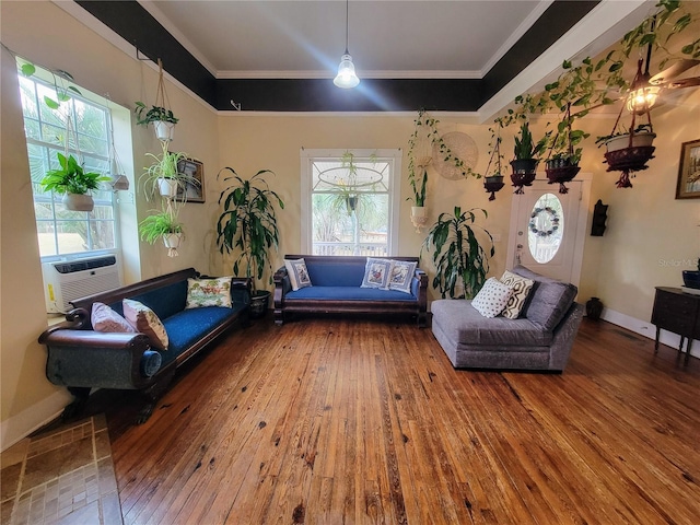 9150 SW 151st Ln, Archer, FL 32618 - living area with hardwood / wood-style floors, crown molding, cooling unit, and baseboards