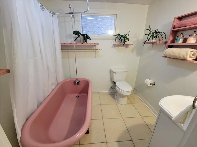 9150 SW 151st Ln, Archer, FL 32618 - full bathroom with tile patterned floors, baseboards, shower / tub combo, and toilet