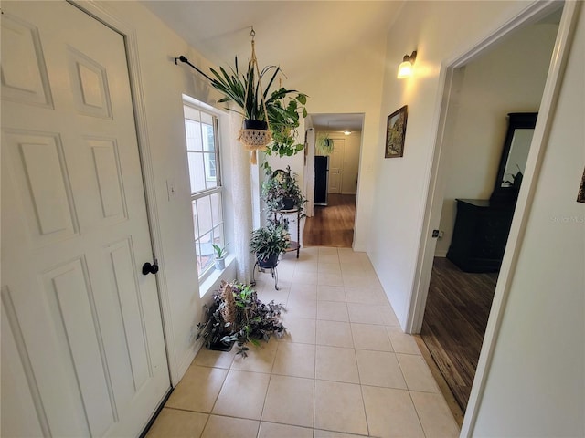 9150 SW 151st Ln, Archer, FL 32618 - corridor with light tile patterned floors and baseboards
