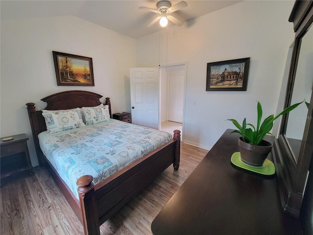 9150 SW 151st Ln, Archer, FL 32618 - bedroom featuring lofted ceiling, wood finished floors, and ceiling fan