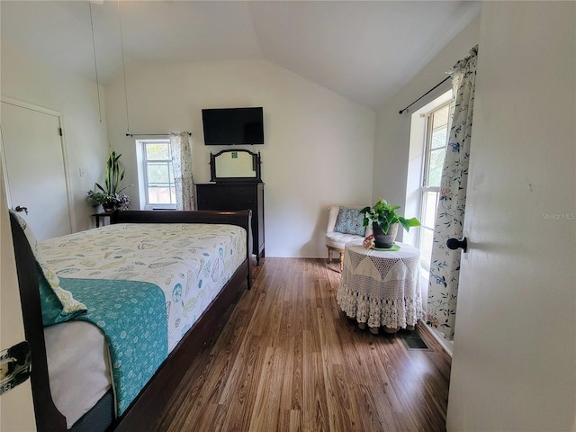 9150 SW 151st Ln, Archer, FL 32618 - bedroom featuring vaulted ceiling and wood finished floors