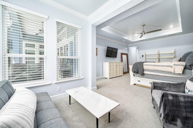 2734 SW 105th St, Gainesville, FL 32608 - bedroom with ornamental molding, carpet, baseboards, and a tray ceiling