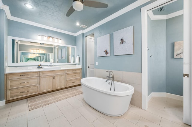 2734 SW 105th St, Gainesville, FL 32608 - full bathroom with a ceiling fan, a soaking tub, vanity, tile patterned flooring, and crown molding