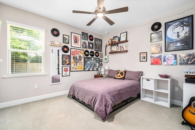 2734 SW 105th St, Gainesville, FL 32608 - carpeted bedroom with baseboards and a ceiling fan