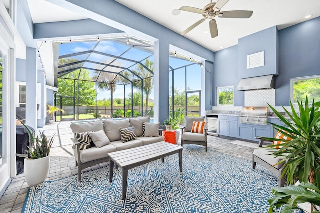 2734 SW 105th St, Gainesville, FL 32608 - sunroom with exterior kitchen, a ceiling fan, and outdoor lounge area