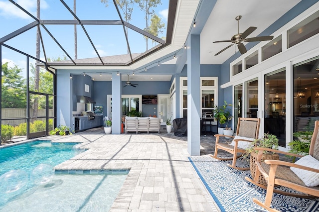 2734 SW 105th St, Gainesville, FL 32608 - view of patio / terrace with a ceiling fan, exterior kitchen, fence, outdoor lounge area, and glass enclosure