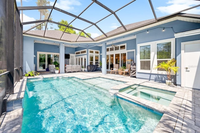 2734 SW 105th St, Gainesville, FL 32608 - view of pool featuring ceiling fan, an outdoor living space, a patio, and a pool with connected hot tub