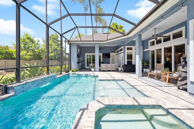 2734 SW 105th St, Gainesville, FL 32608 - view of swimming pool featuring a ceiling fan, a patio, an in-ground hot tub, an outdoor hangout area, and glass enclosure