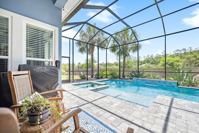 2734 SW 105th St, Gainesville, FL 32608 - view of pool featuring a patio, a lanai, and a pool with connected hot tub