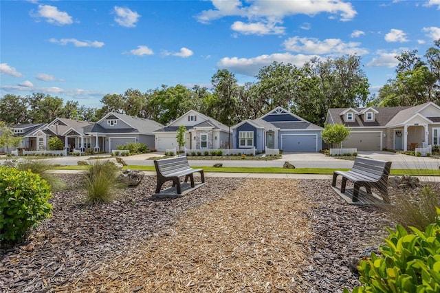 surrounding community with a residential view and driveway