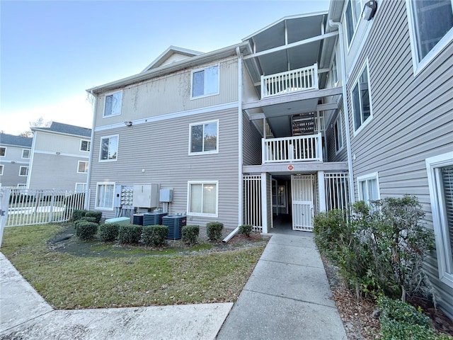 4000 SW 23rd St Unit 3-107, Gainesville, FL 32608 - view of building exterior featuring central AC unit and fence