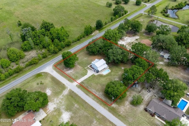 11802 SW 83rd Dr, Lake Butler, FL 32054 - drone / aerial view with a rural view and a water view