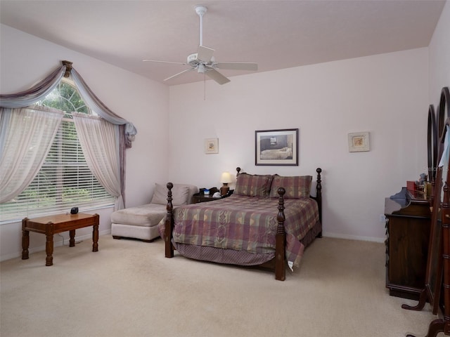 10712 SW 12th Ter, Micanopy, FL 32667 - bedroom featuring light carpet, baseboards, and a ceiling fan
