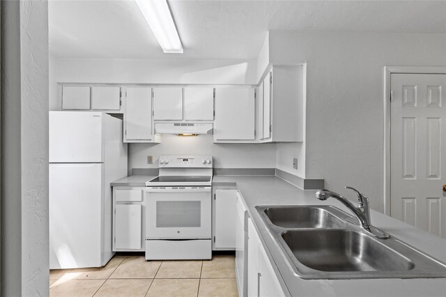 2219 SW 39th Way, Gainesville, FL 32607 - kitchen featuring white appliances, under cabinet range hood, a sink, light tile patterned flooring, and white cabinetry