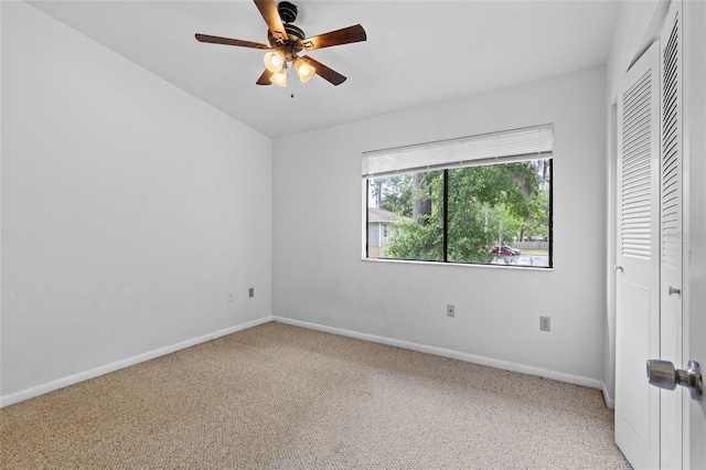 2219 SW 39th Way, Gainesville, FL 32607 - unfurnished bedroom featuring carpet flooring, baseboards, a closet, and a ceiling fan