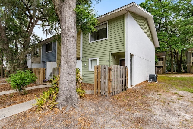 2219 SW 39th Way, Gainesville, FL 32607 - view of front facade featuring fence and cooling unit