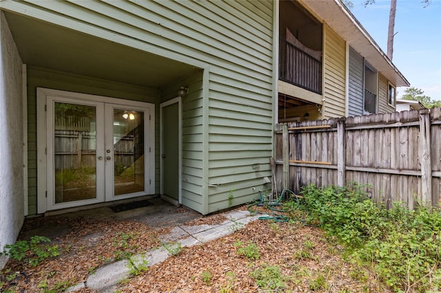 2219 SW 39th Way, Gainesville, FL 32607 - property entrance featuring french doors and fence