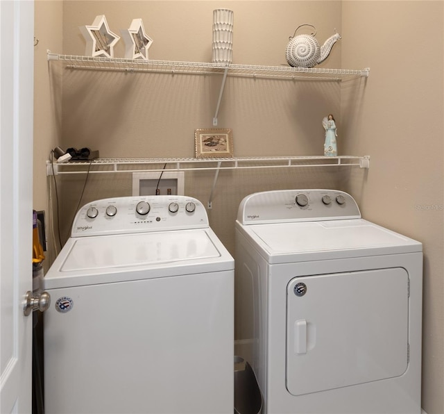 6243 SW 46th Dr, Gainesville, FL 32608 - clothes washing area with separate washer and dryer