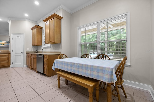 dining space with crown molding, light tile patterned floors, baseboards, and recessed lighting