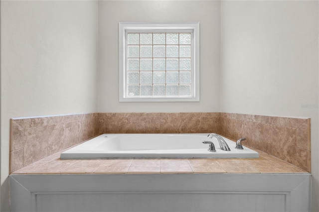 bathroom with a garden tub