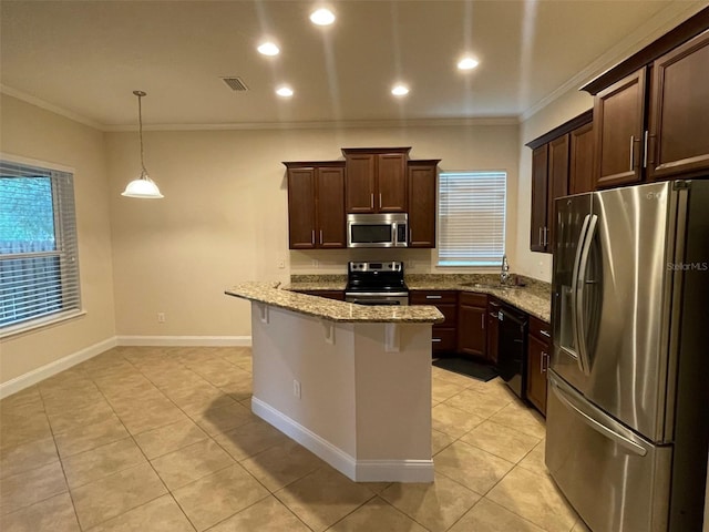8216 NW 54th St, Gainesville, FL 32653 - kitchen featuring stainless steel appliances, a sink, crown molding, light stone countertops, and a breakfast bar