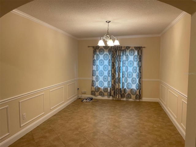 8216 NW 54th St, Gainesville, FL 32653 - empty room with a decorative wall, arched walkways, ornamental molding, a chandelier, and a textured ceiling