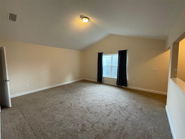 8216 NW 54th St, Gainesville, FL 32653 - additional living space featuring carpet, lofted ceiling, and baseboards