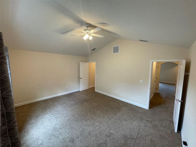 8216 NW 54th St, Gainesville, FL 32653 - unfurnished bedroom with lofted ceiling, carpet floors, baseboards, and a ceiling fan