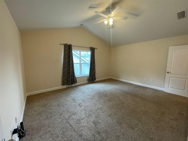 8216 NW 54th St, Gainesville, FL 32653 - carpeted spare room with a ceiling fan, vaulted ceiling, and baseboards