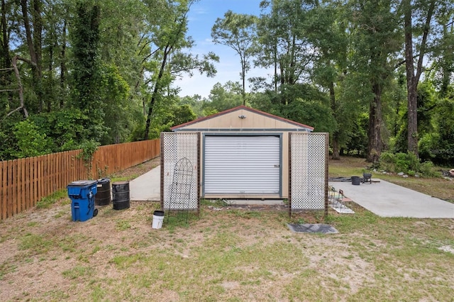garage with fence