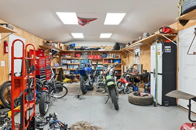 garage featuring wooden walls