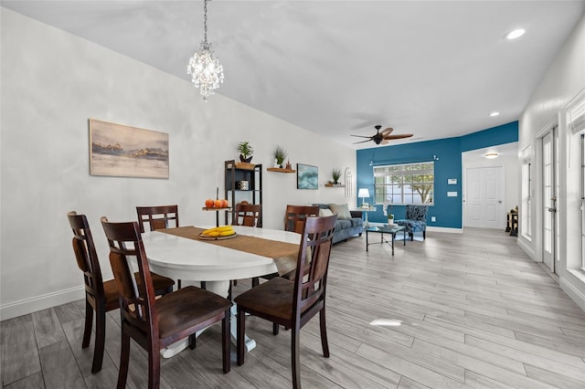 7202 NW 52nd Ter, Gainesville, FL 32653 - dining room featuring light wood finished floors, ceiling fan, baseboards, recessed lighting, and a chandelier