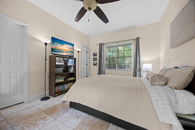 7202 NW 52nd Ter, Gainesville, FL 32653 - bedroom with baseboards and ceiling fan