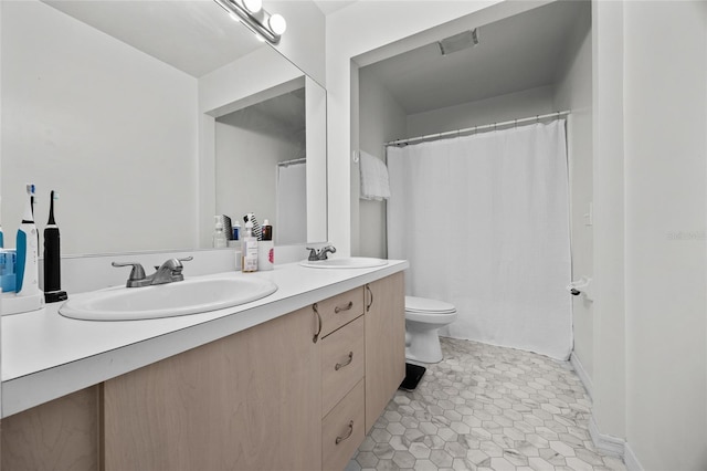 7202 NW 52nd Ter, Gainesville, FL 32653 - bathroom featuring toilet and double vanity