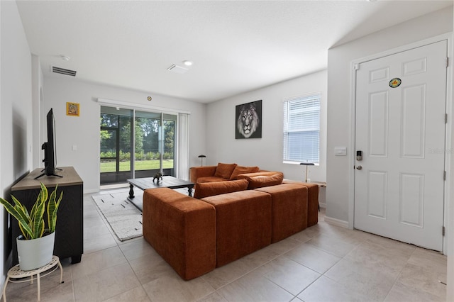5237 NW 48th Pl, Ocala, FL 34482 - living area featuring light tile patterned flooring
