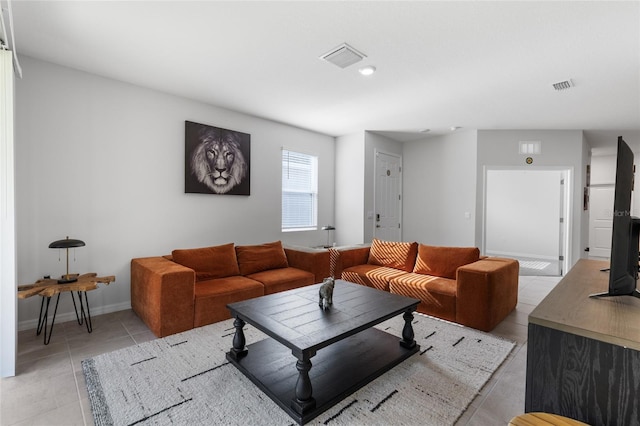 5237 NW 48th Pl, Ocala, FL 34482 - living room featuring light tile patterned floors and recessed lighting