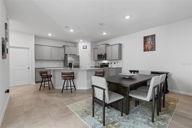 5237 NW 48th Pl, Ocala, FL 34482 - dining area with recessed lighting and baseboards