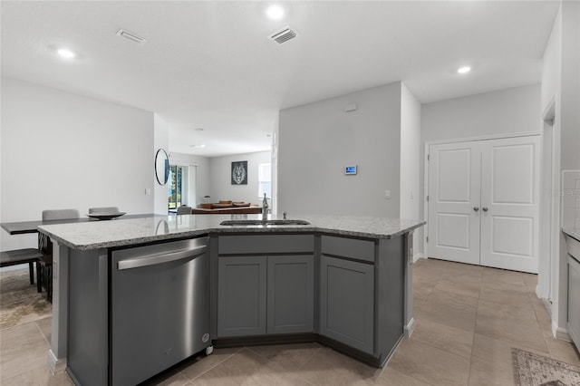 5237 NW 48th Pl, Ocala, FL 34482 - kitchen with dishwasher, gray cabinets, open floor plan, recessed lighting, and a kitchen island with sink
