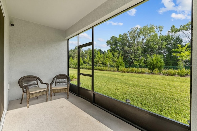 5237 NW 48th Pl, Ocala, FL 34482 - unfurnished sunroom featuring view of wooded area