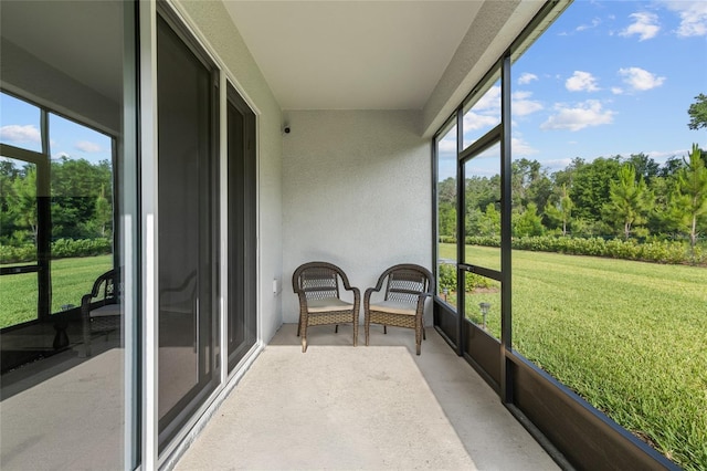 5237 NW 48th Pl, Ocala, FL 34482 - sunroom featuring view of wooded area