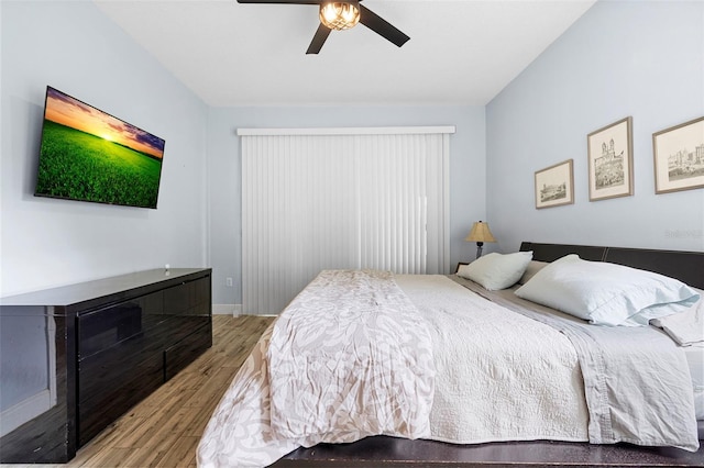 23510 Oak Prairie Cir, Sorrento, FL 32776 - bedroom with wood finished floors and a ceiling fan