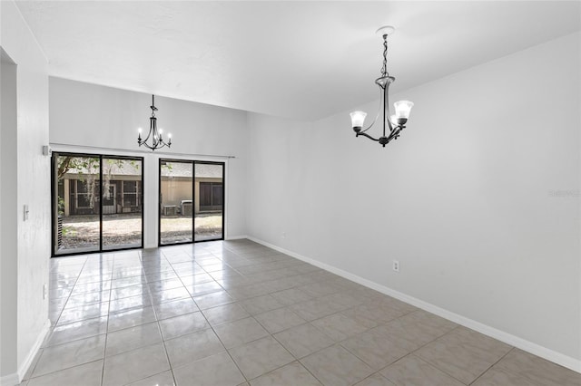 unfurnished dining area with a chandelier, light tile patterned floors, and baseboards