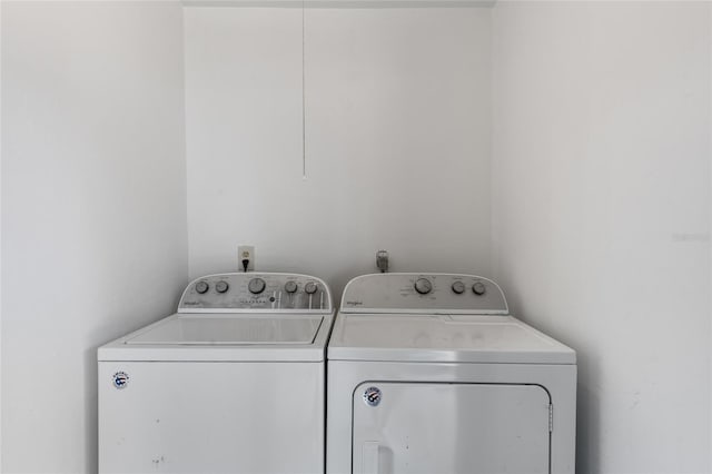 washroom with washer and clothes dryer
