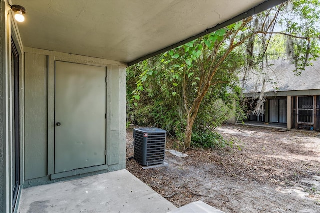 view of outbuilding featuring central air condition unit